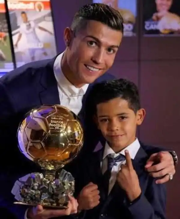 Cristiano Ronaldo & son pose with his 2016 Ballon D